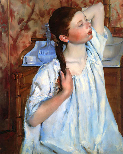 Girl Arranging Her Hair art print by Mary Cassatt (1886)