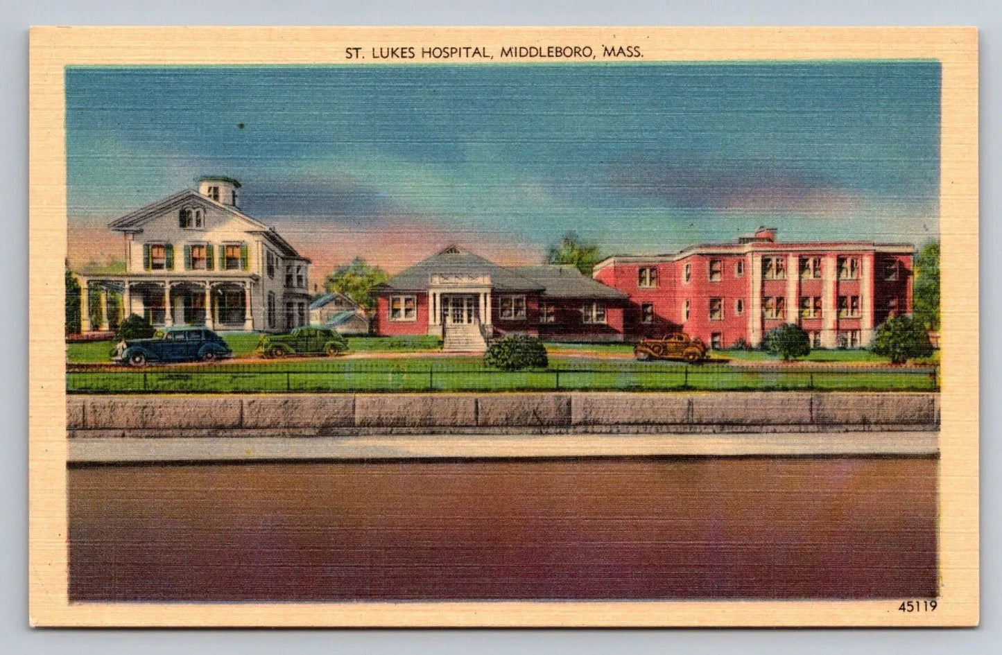 St. Lukes Hospital, Middleboro, Mass. Road in Foreground, Houses Postcard