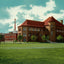 University of Minnesota Pillsbury Hall and Shops in 1906 Vintage Print