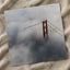 An Aerial View of the Golden Gate Bridge in the Clouds Photo Print (6 Sizes)