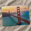 Aerial View of Traffic Moving on Golden Gate Bridge During Sunset Photo Wall Art