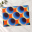 Blue Spheres Against a Vibrant Orange Matte Art Print (7 Sizes) - High Quality