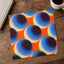 Blue Spheres Against a Vibrant Orange Matte Art Print (7 Sizes) - High Quality