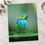 Colorful Bird Perched on Top of Green Leaf Photographic Art Print (7 Sizes)