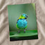 Colorful Bird Perched on Top of Green Leaf Photographic Art Print (7 Sizes)