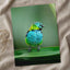 Colorful Bird Perched on Top of Green Leaf Photographic Art Print (7 Sizes)