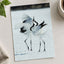 Two Red-Crowned Cranes Dancing on Snow Photographic Art Print (4 Sizes)