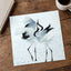 Two Red-Crowned Cranes Dancing on Snow Photographic Art Print (4 Sizes)