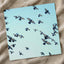 Flock of Pigeons Flying in Clear Blue Sky Photographic Art Print (7 Sizes)