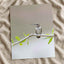 Hummingbird on Branch with Green Leaves Dripping Springs Photo Print (7 Sizes)