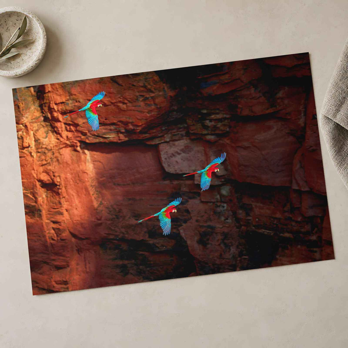 Three Macaws Fly Near a Rocky Cliff Face Photo Wall Print (7 Sizes) - Frameable