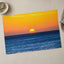 Low Sun on Horizon Above a Dark Blue Ocean Photo Wall Print (7 Sizes)