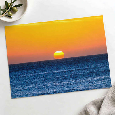 Low Sun on Horizon Above a Dark Blue Ocean Photo Print Wall Decor