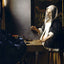 Woman Holding a Balance art print by Johannes Vermeer (1665)