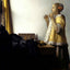 Young Woman with a Pearl Necklace art print by Johannes Vermeer (1662)